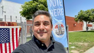 Councilman Martin Herrera campaigns in 2022.