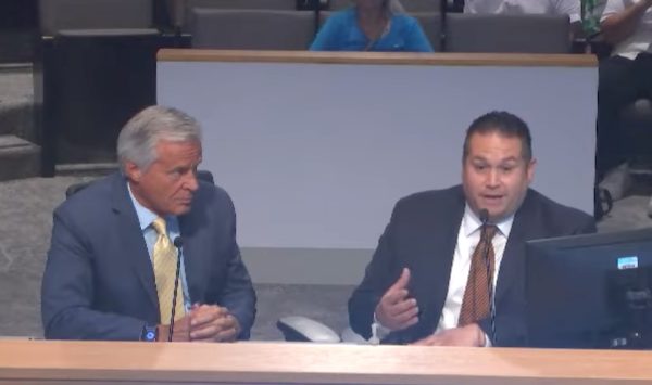 Paul Toomey, a planning manager for the county, and Planning Chief Paul Gonzales brief the Board of Supervisors last week on the proposed Lonely Dove Motel expansion.
