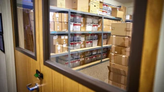A recently installed lock and seal secures November 2024 and June 2026 election ballots in a room at the Market Street elections office in Redding on Sept. 17, 2026.