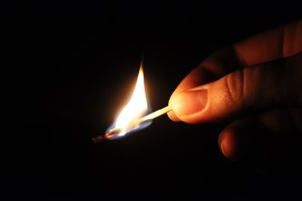 Lit match, arson.