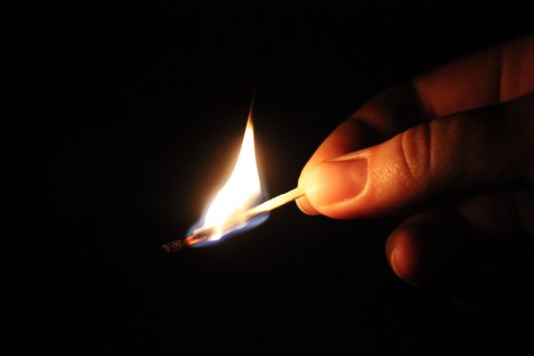 Lit match, arson.
