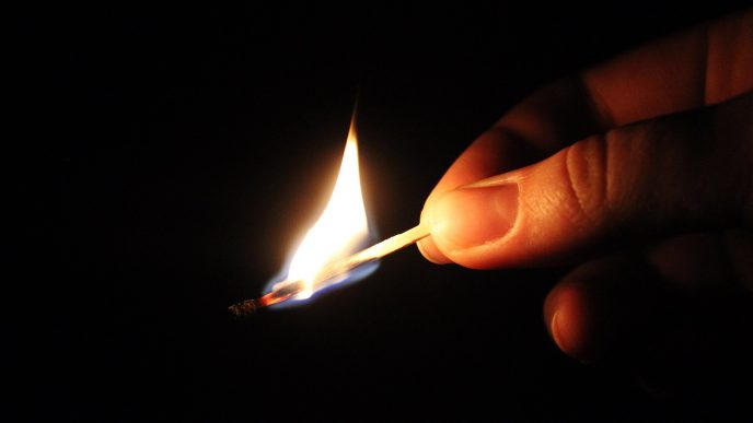 Lit match, arson.