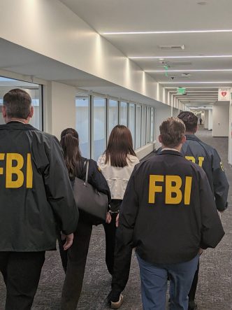 FBI agents arrest Wanying "Heather" Zhang at LAX Sunday, Oct. 5, 2026.