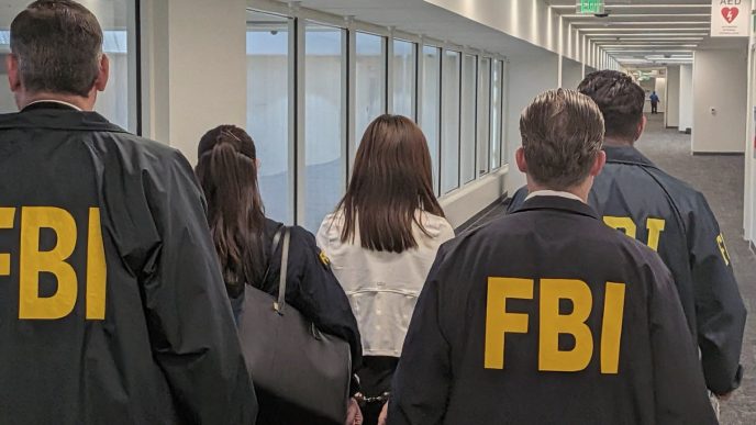 FBI agents arrest Wanying "Heather" Zhang at LAX Sunday, Oct. 5, 2026.